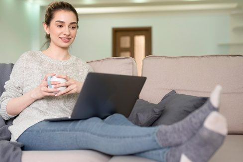 freelance-woman-couch-working-from-home